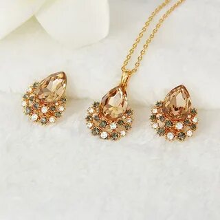 Сережки золотые комплекты