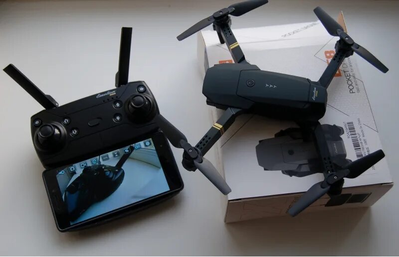 Eachine e58 wifi. Квадрокоптер е58. Квадрокоптер Nibiru e58. Eachine e58. Квадрокоптер с камерой е 58.