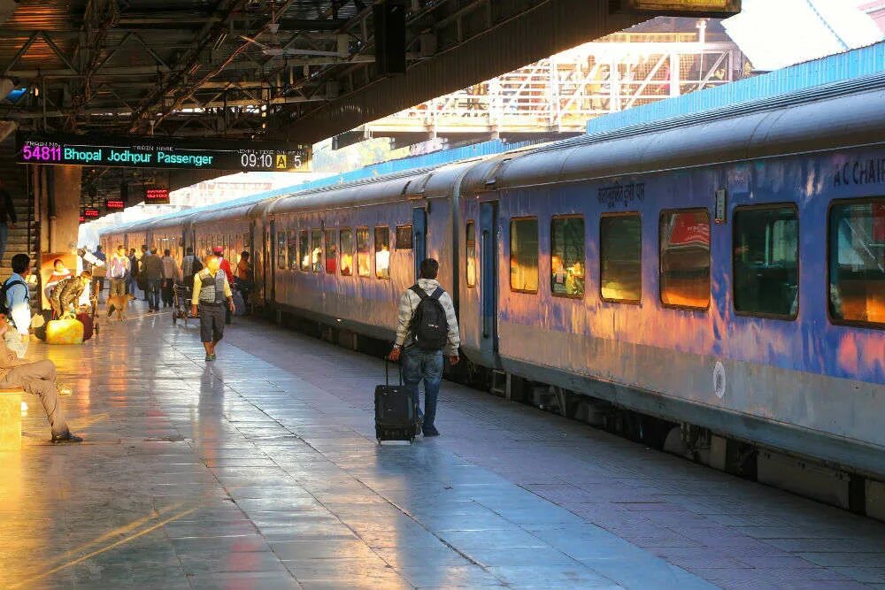 I that i at the station. Indian jaipur railway station. passenger train. какие поезда метро ходят в джайпуре. 2 buses and trains that people pay to travel on.