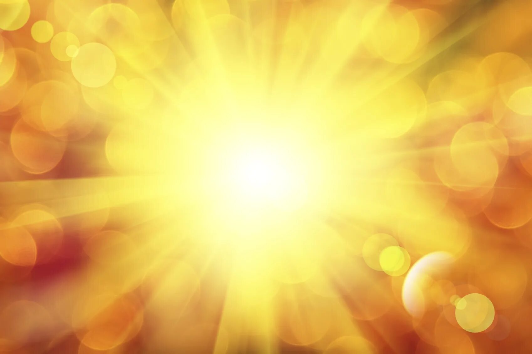 золотисто-оранжевый цвет. желтый свет. оранжевый фон. желтый цвет. лучи солнца.