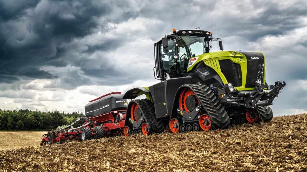 Трактор CLAAS Xerion. Ксерион 5000. Трактор CLAAS Xerion новый. CLAAS Xerion комбайн. Тракторные оборудование