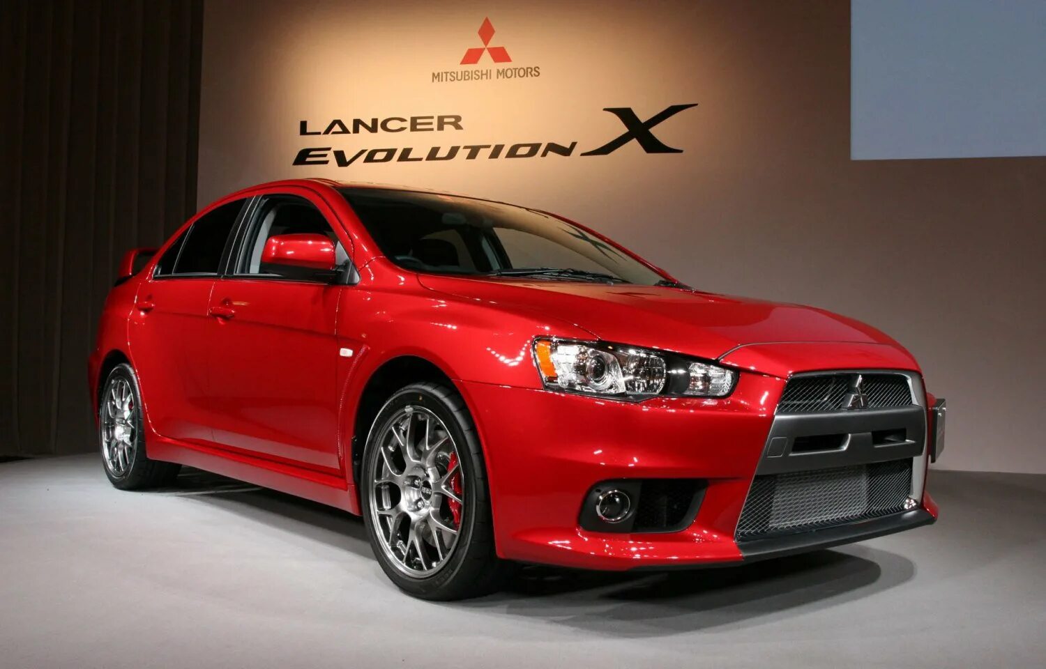 Что значит mitsubishi. Lancer Evolution 10. Мицубиси Лансер x10. Митсубиси Лансер Эволюшн 2012. Mitsubishi Lancer Evolution x (2007).