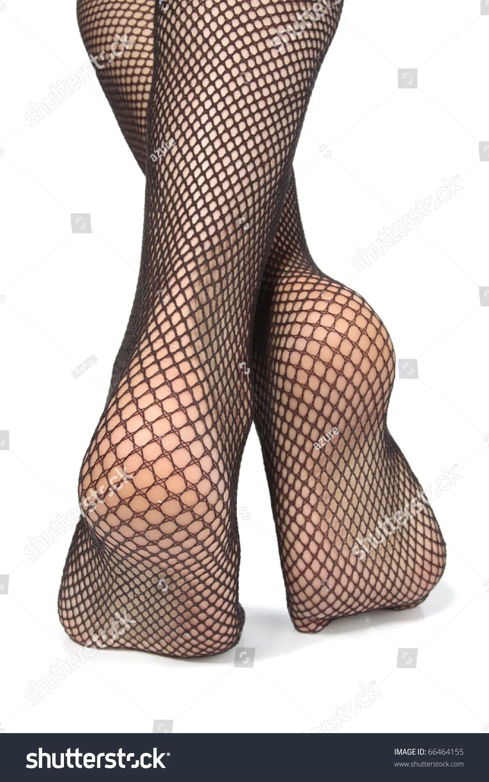 Spread feet. Feet in fishnets. Fishnet feet. Barefoot fishnet.