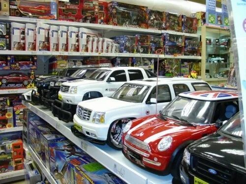 Магазин игрушек машины. Детский магазин машинок. Магазин игрушечных машин. Магазин игрушек машинки.. Магазин мир машин