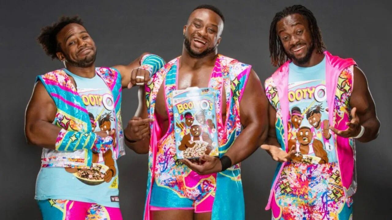 A new day now. Рестлеры New Day. New Day WWE хлопья. New Day New. Футболка WWE.