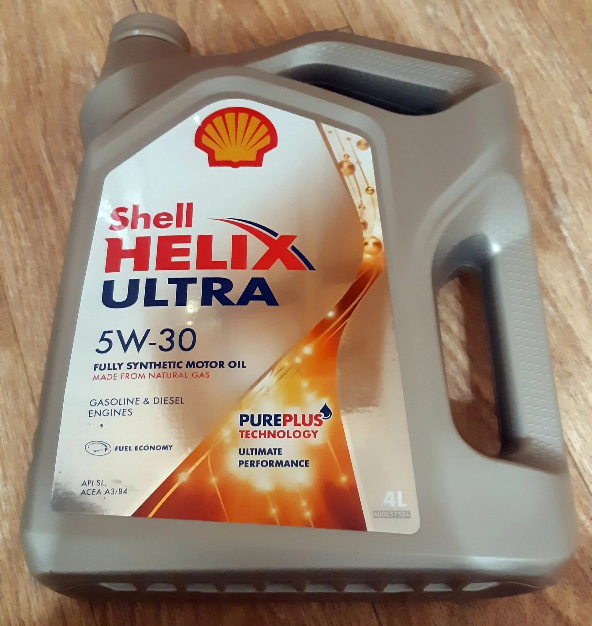 Масло моторное шелл хеликс ультра 5w30 купить. Шелл Хеликс ультра 5w30. Shell 550046387 масло моторное синтетическое "Helix Ultra 5w-30 4л. Шелл Хеликс ультра 5w30 синтетика. Shell Helix 5 30.