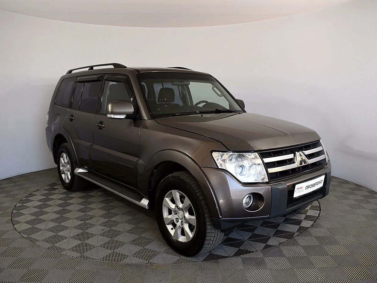 Купить паджеро 4д56. Митсубиси Паджеро 4. Mitsubishi Pajero 4 коричневый. Pajero 4 2007. Mitsubishi Pajero 2010.