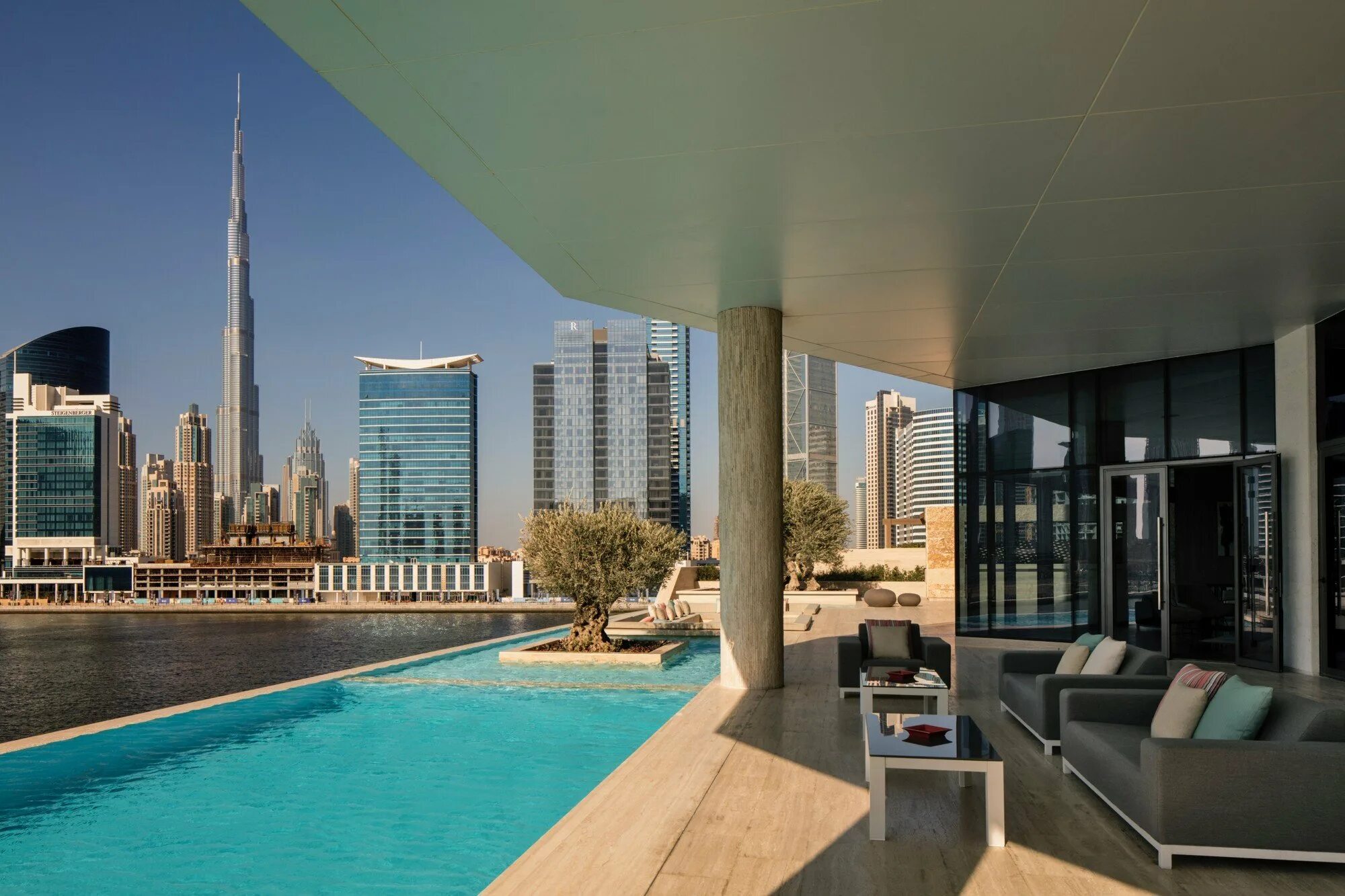 Купить недвижимость в д. Peninsula three Дубай. Peninsula one Дубай. Бурдж-Халифа Дубай пентхаус. Вращающаяся башня Дубай арабские эмираты.