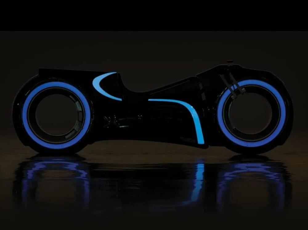 Беговел tron. Велосипед в стиле трон. Трон светоциклы игра. Tron bike. Скутер будущего.