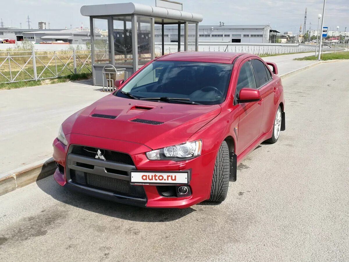 Митсубиси купить б лансер. Mitsubishi Lancer Evolution x 2008. Mitsubishi Lancer 4wd Evolution 10. Mitsubishi Lancer x 2.0 4wd. Митсубиси Эволюшн 10 красный.