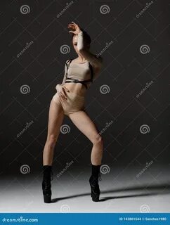 Photo about strip dancer posing in studio. 