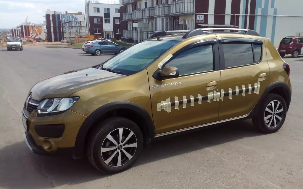 Двери сандеро степвей купить. Молдинги Renault Sandero Stepway 2. Молдинги на Рено Сандеро степвей 2. Renault Sandero Stepway 2 расческа. Наклейки Renault Sandero Stepway.