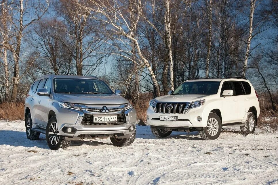 Toyota land cruiser 200 vs mitsubishi pajero. Паджеро 150. Что лучше прадо или паджеро. Ленд крузер паджеро. Что лучше прадо или паджеро.