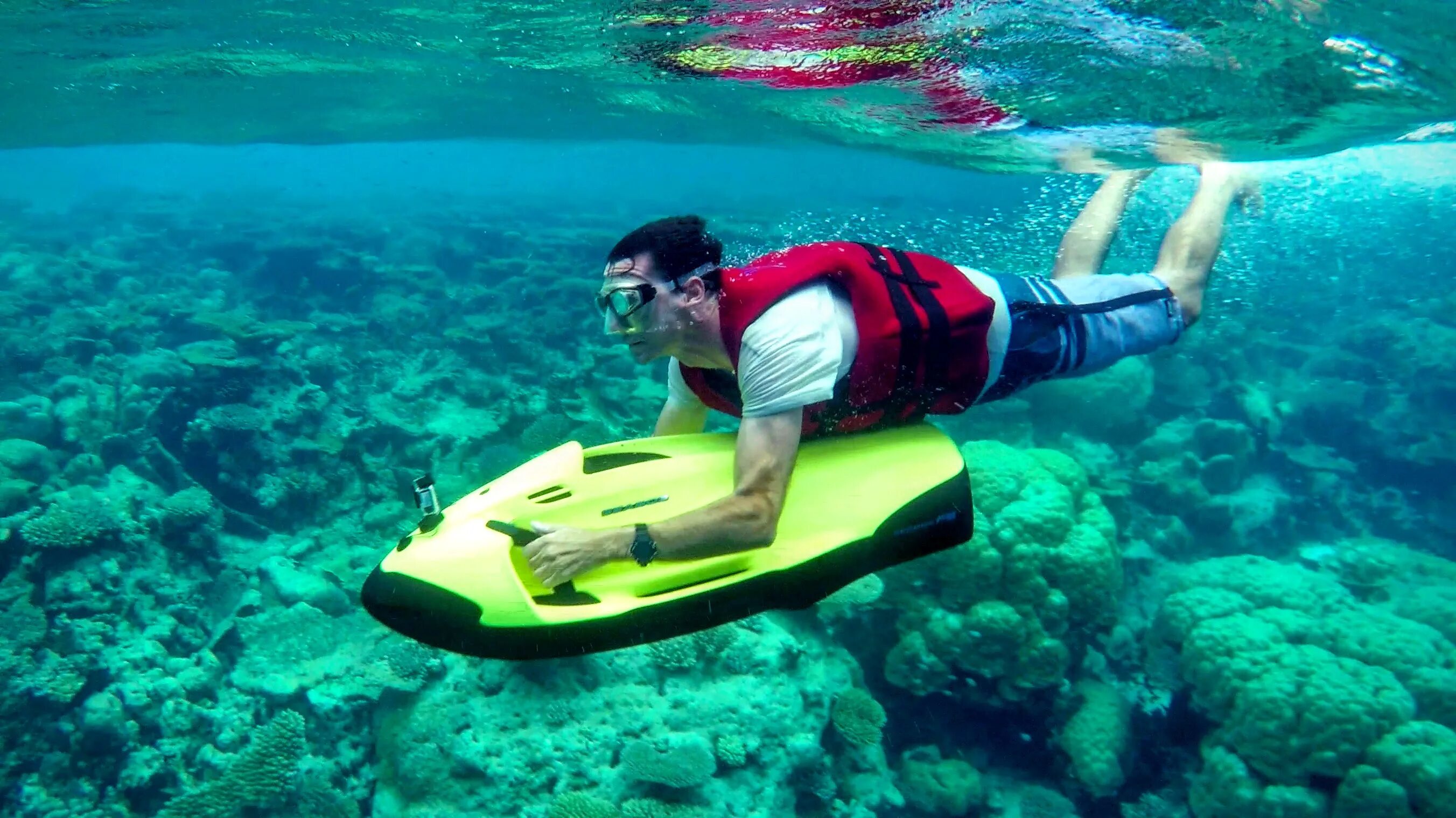 Увлекаться водным. Seabob на Мальдивах. Аутригер Мальдивы. Водные аттракционы Мальдив. Мальдивы развлечения.