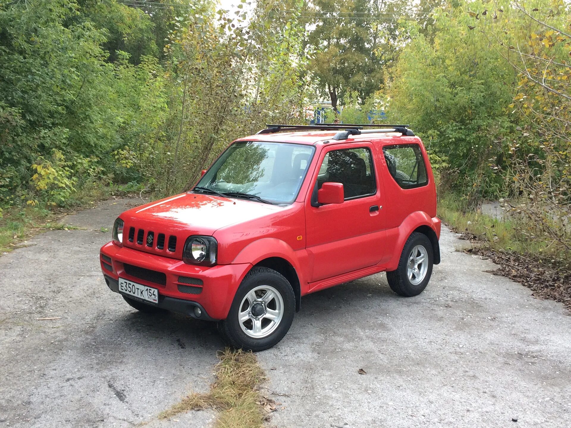 Купить сузуки джимни в спб. Suzuki Jimny 2010. Сузуки Джимни красный. Suzuki Jimny 2002. Судзуки Джимни красный.