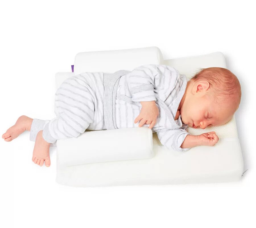 Подушка новорожденному с какого возраста. Traumeland подушка Visco 32 x 40 см.0-8 мес.. Traumeland позиционер для сна. Ортопедическая подушка для младенцев. Подушка позиционер для новорожденных.