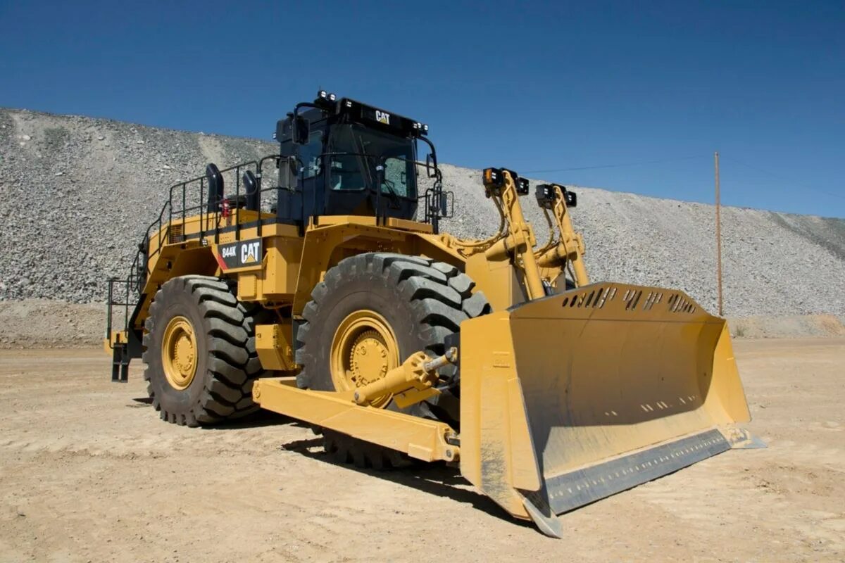 Бульдозер Cat 844k. Колесный бульдозер Caterpillar 844h;. Катерпиллер 834 бульдозер. Колёсный бульдозер Cat 834h.