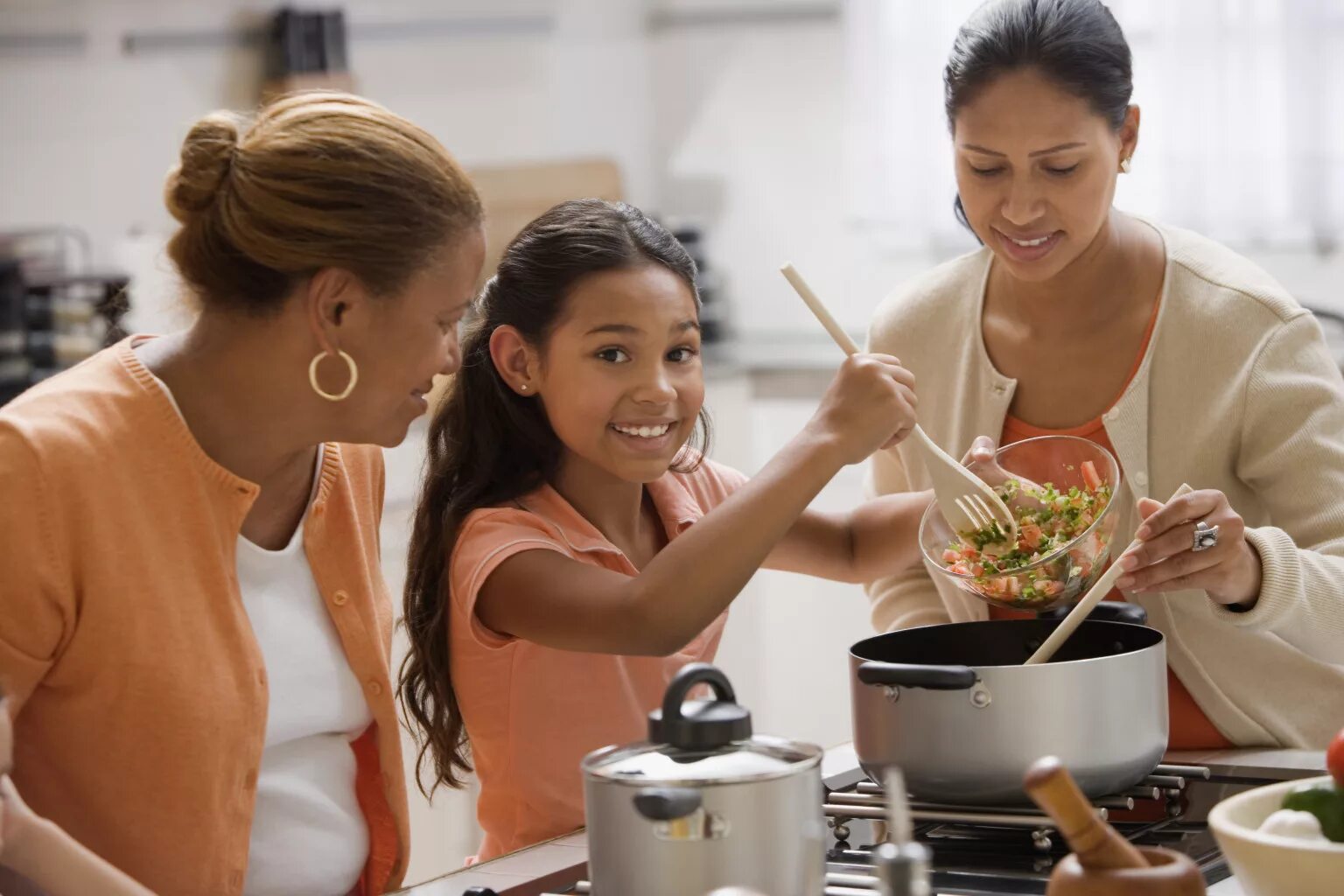 They are women. Кулинария пипл. child on kitchen. the children are cooking. mother and daughter cooking.