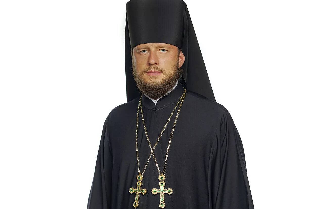 Поп в рясе