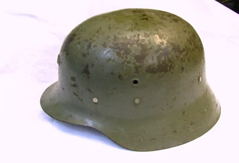 Штальхельм м38. Каска stahlhelm м35. Каска солдат вермахта люфтваффе. Каски мировых войн. Каски мировых войн.