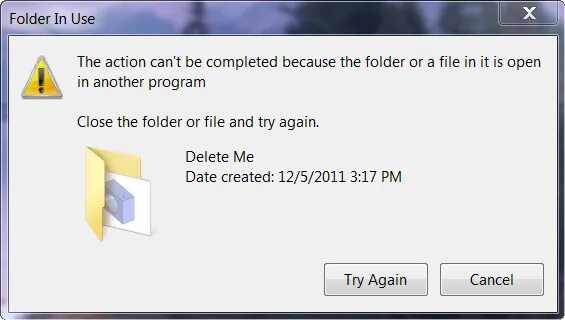 File is open in another program. Файл занят другой программой.
