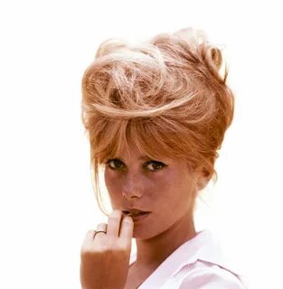 A History of Big Hair: Catherine Deneuve, Cindy Crawford, and More - Vogue ...