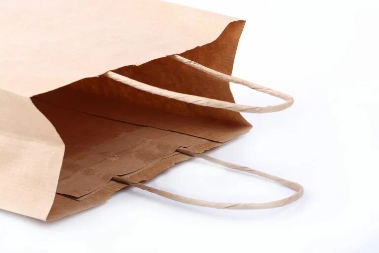 Бумажный пакет лежит. Пакет бумажный с логотипом. Крафтовый пакет без фона. Бумажный пакет для фотошопа. Пакет крафт 26х15х35 с кручеными ручками eco carrbag tw 1 шт.