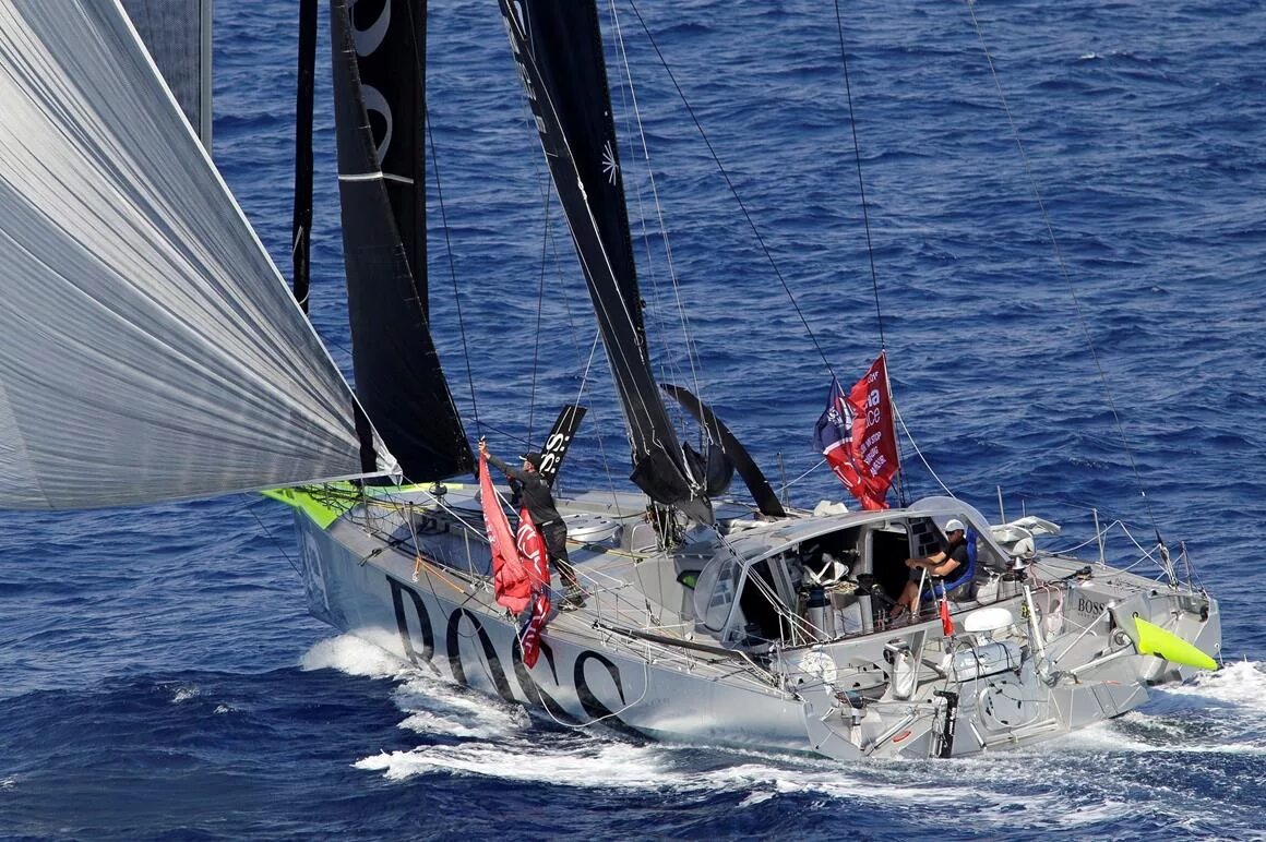 Яхта imoca класса open 60:. Парусная яхта хуго босс. Ocean race 2023. Open 60. Яхта планета океан опен 60.