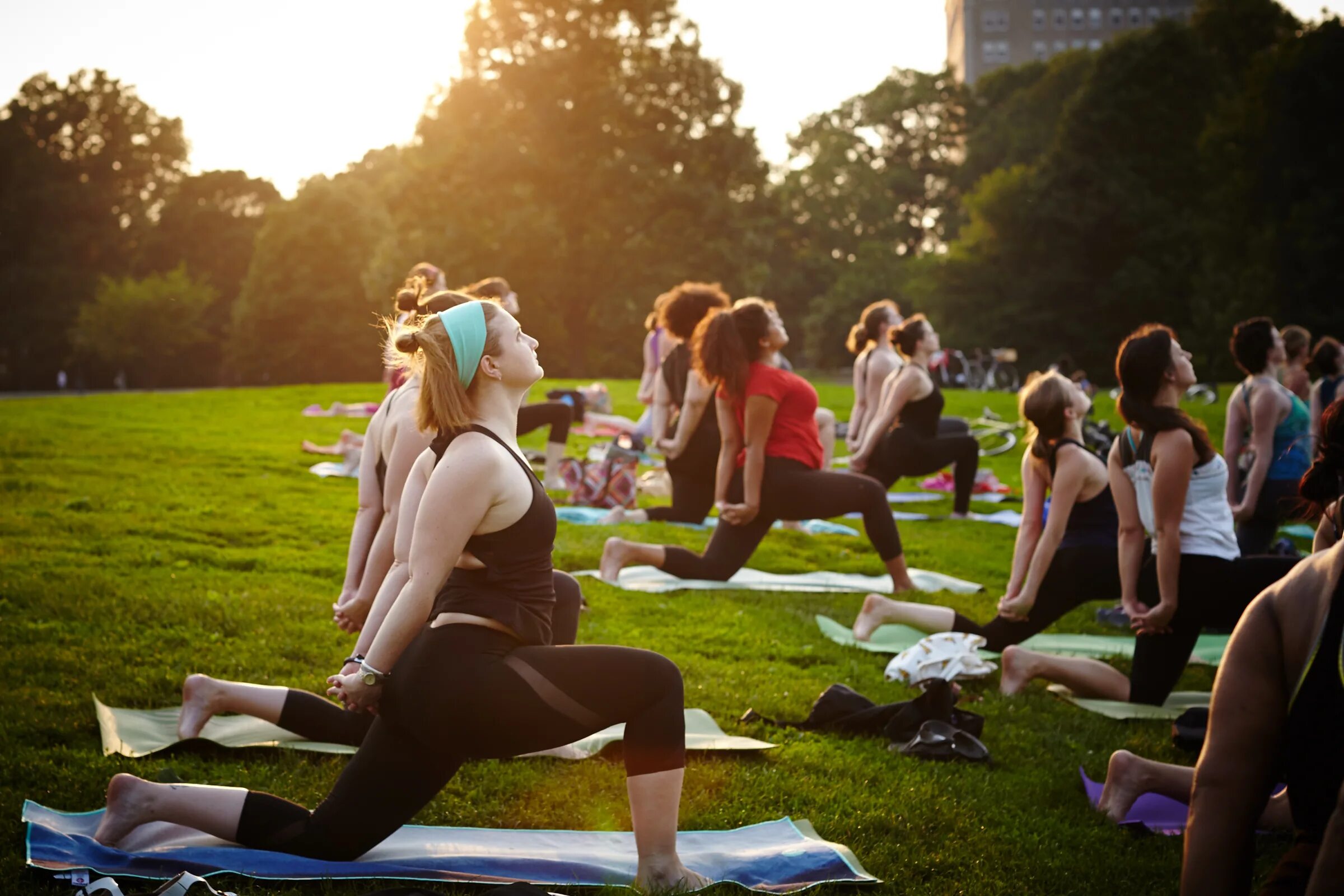 Yoga Outdoor Park. Teenagers in the Park. Singing in the Park. Circle of Yoga people in the Park. Lot of people in the park