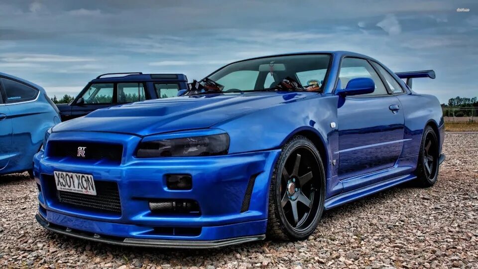 Легендарный ниссан скайлайн. Про ниссан скайлайн. Godzilla r34. Nissan skyline r34 gt-r. Nissan skyline gtr 34.
