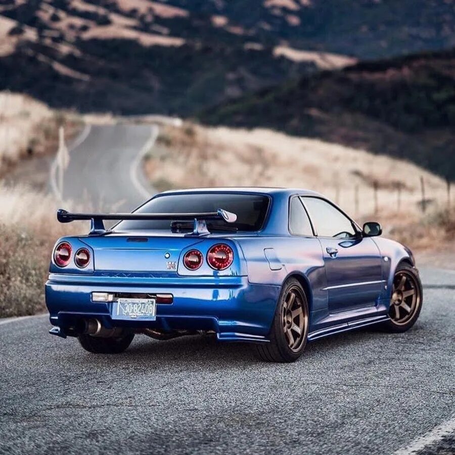 Скай лайн. Nissan Skyline GTR r34. Nissan Skyline r34 gt-r. Nissan Skyline GTR 34. Ниссан Скайлайн ГТР 34.