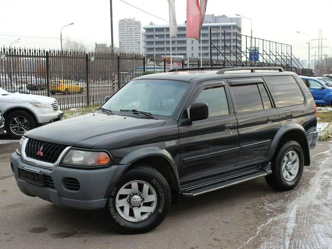 Митсубиси монтеро 1 поколение. Montero Sport 2001. Митсубиси Монтеро спорт 2001. Митсубиси Монтеро спорт 2001 черный. Митсубиси Монтеро спорт 2001 3.0.