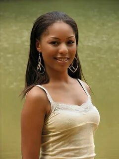 A beautiful African American teen girl posing by a lake : Free Stock Photo ...