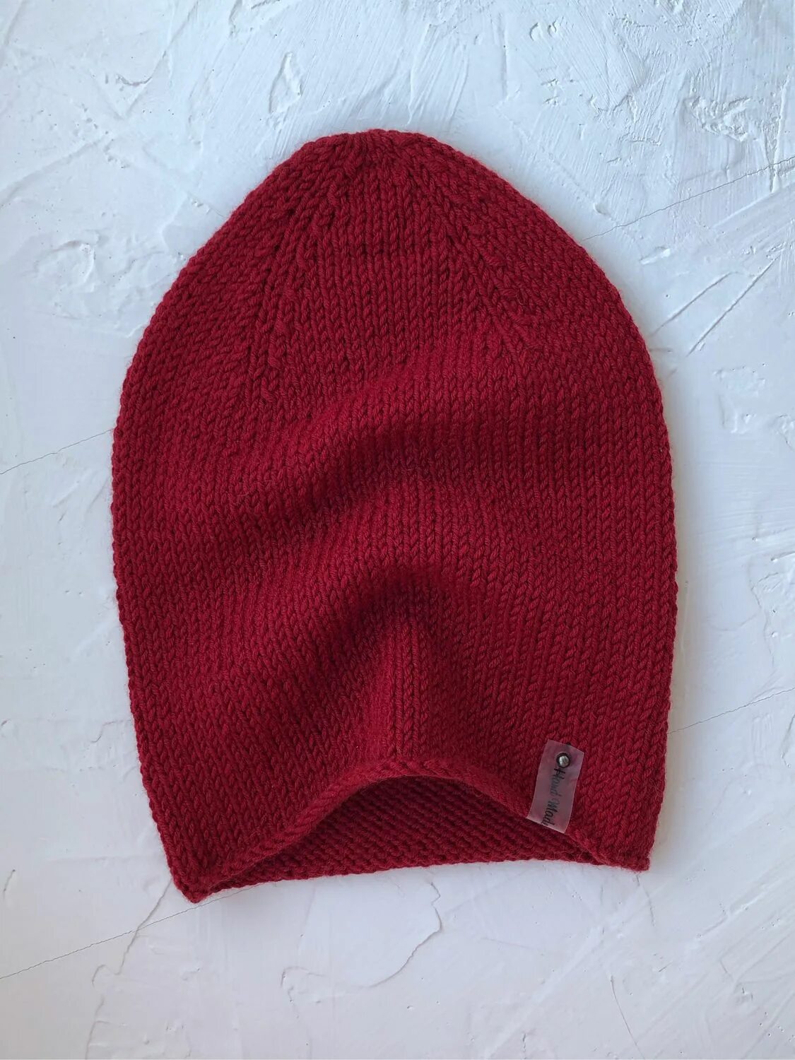 Бини макушка. Шапка поворотными рядами. Вязаная шапка с удлиненной макушкой. Вязаная шапка с красивой макушкой. Бини макушка.