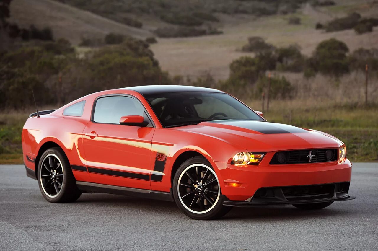 Ford Mustang Boss 302 2012. Форд Мустанг босс 302 2011. Ford Mustang 2012. Ford Mustang Boss 302 2012 Orange.