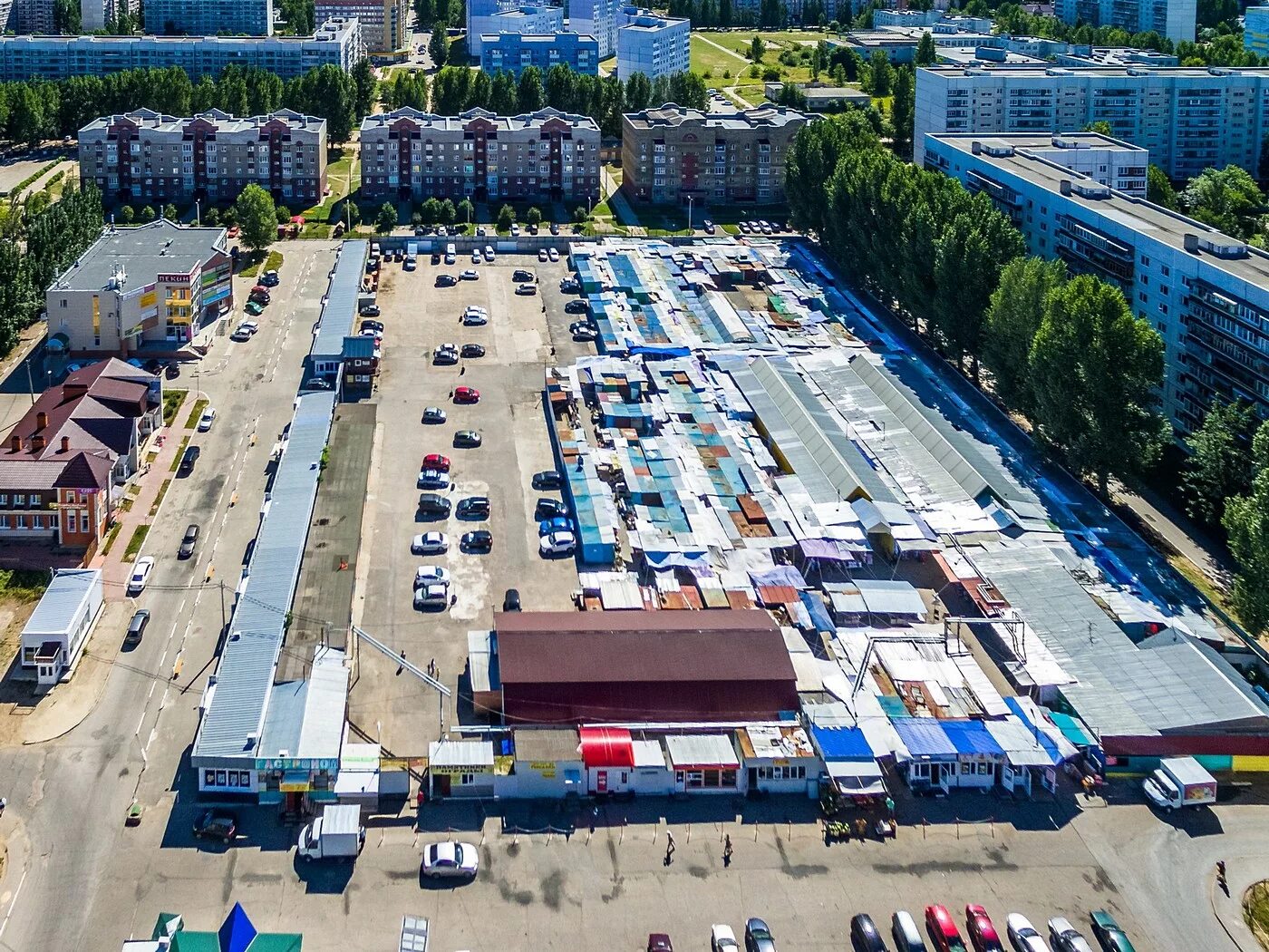 Ульяновский рынок новый город в Ульяновске. Ленинского Комсомола 19 Ульяновск. Ульяновск Заволжский рынок. Ульяновск проспект Ленинского Комсомола с высоты.