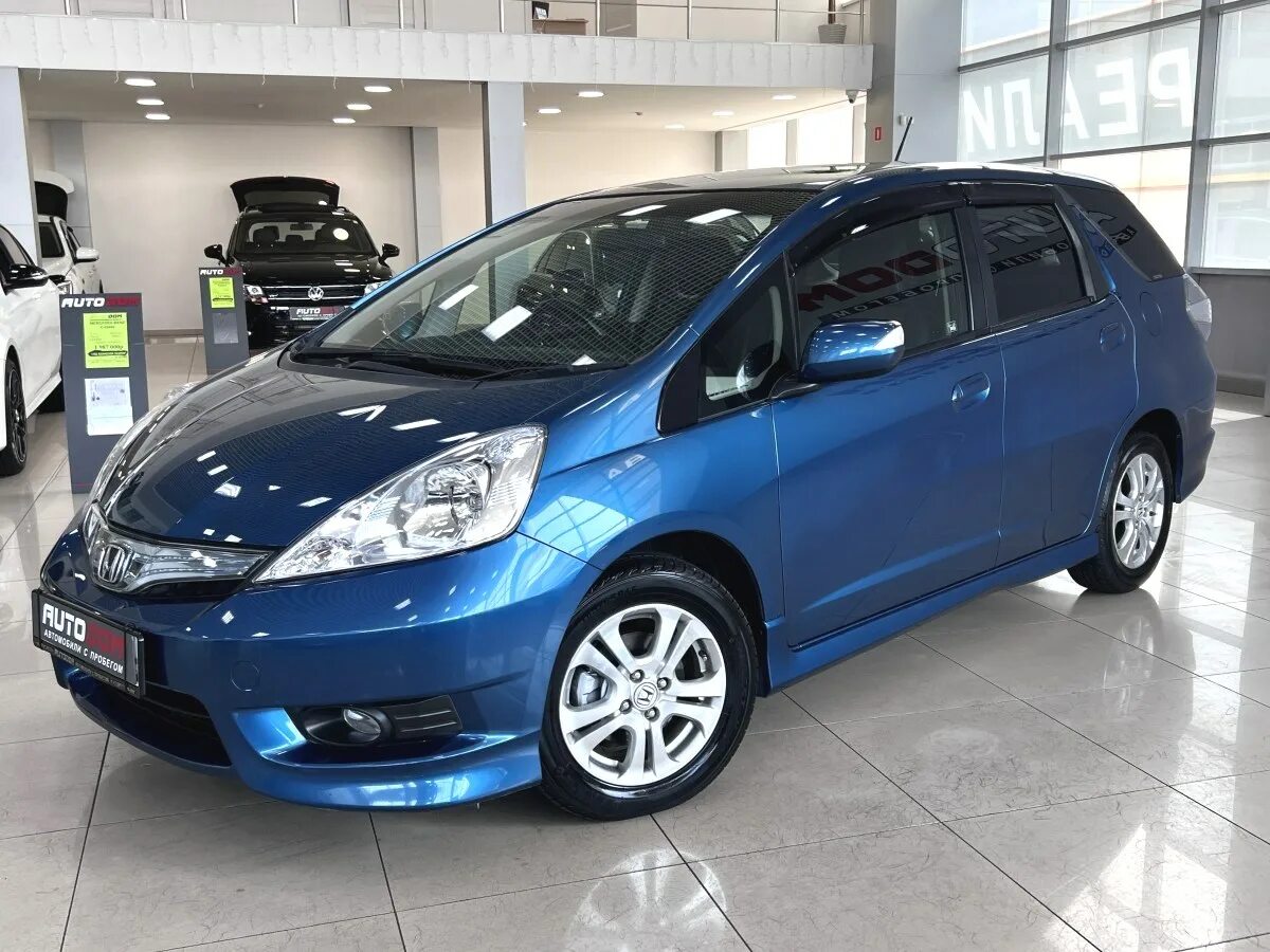 Фит шаттл 2011 год. Хонда фит шаттл 2011. Honda Fit Shuttle салон. Хонда фит шаттл 2012 мультимедиа. Хонда фит шаттл 1.3 гибрид масляный фильтр.