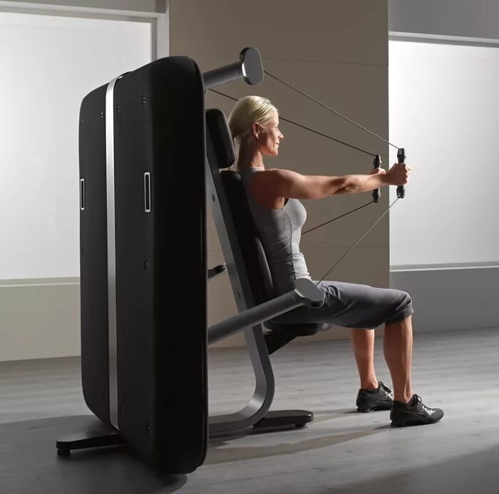 Телефон тренажер. Technogym Кинезис. Тренажер Кинезис Техноджим. Technogym Kinesis упражнения. Technogym брусья.