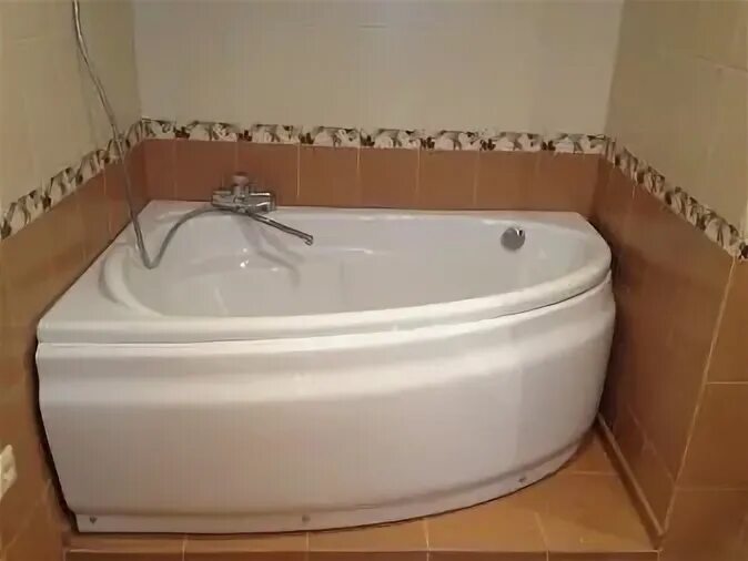 Как установить угловую ванную