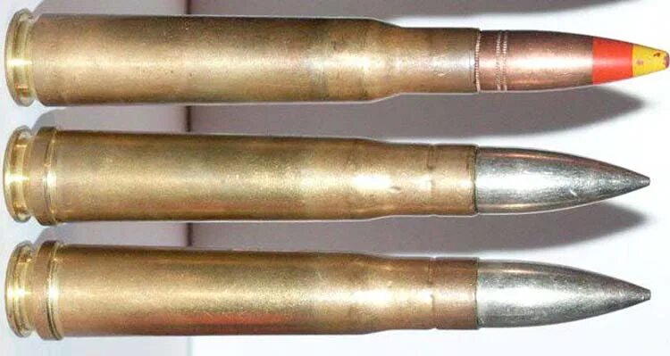 Калибр 12.7 мм патрон. Калибр 50 BMG. Калибр 12.7 мм и ,50. Пуля 50 BMG.