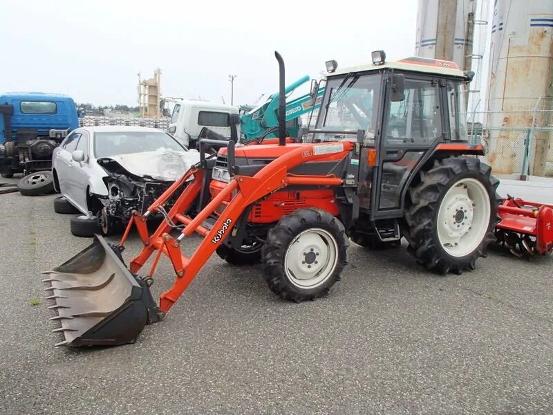 Kubota t22. Японский минитрактор. Минитрактор за 80 000. Японские тракторы владивосток. Японский трактор.