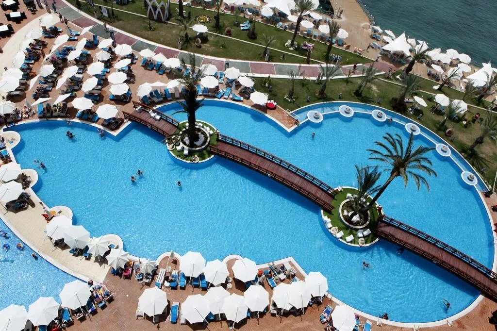 Granada luxury alanya. Гранада лакшери Окурджалар Турция. Отель Granada Luxury Resort Spa 5. Отель в Турции Granada Luxury. Турция отель Гранада Алания.