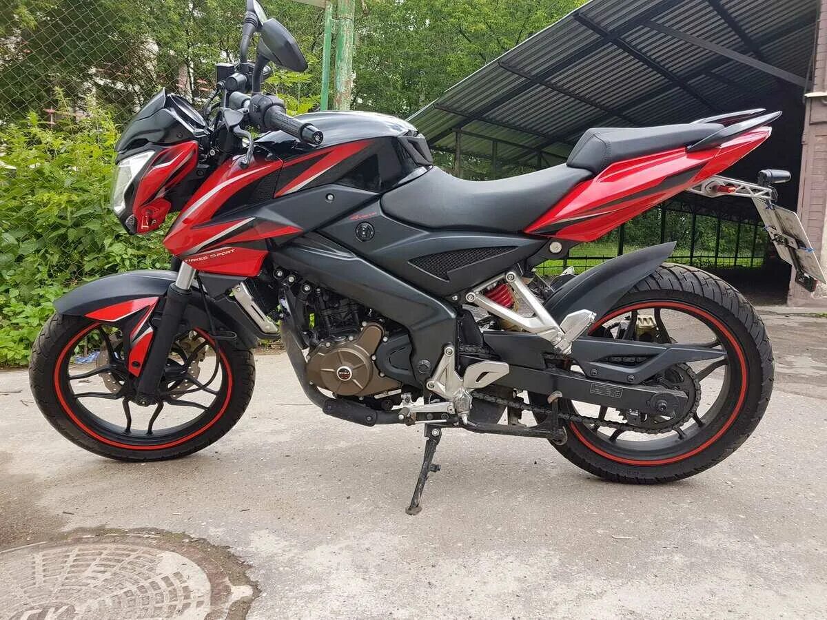 Bajaj pulsar ns. Bajaj pulsar ns200. bajaj pulsar ns200 красный. баджадж пульсар нс 200. bajaj 200 pulsar красный.