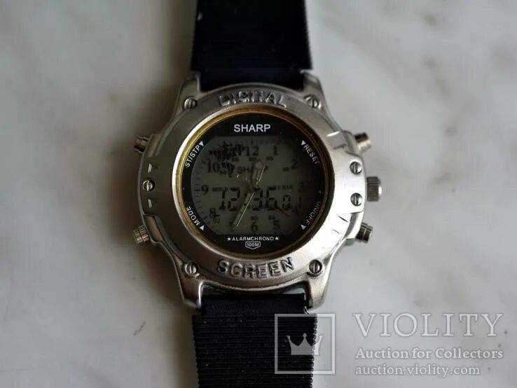 Время sharp. Часы шарп. часы шарп электронные. часы sharp quartz. часы шарп индикатор.
