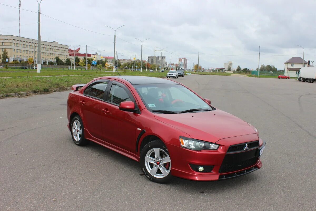 Mitsubishi lancer 10 размеры. Митсубиси Лансер 10 красный. Митсубиси 10 красная. Lancer x 2008 красный. Лансер 10 стандарт.