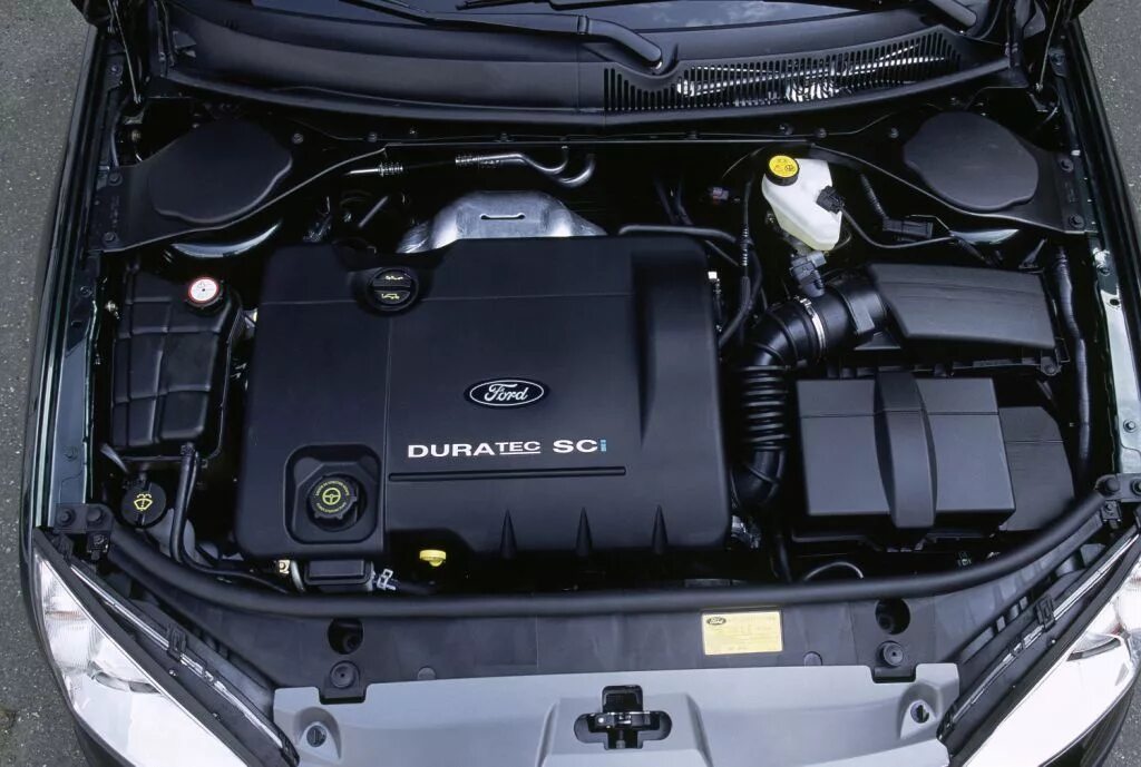 Мондео какой мотор. Мотор ford mondeo 3 1.8. двигатель форд мондео 3 1.8. моторный отсек форд мондео 4 двигатель 1.6. форд мондео мотор 2 литра под капотом.