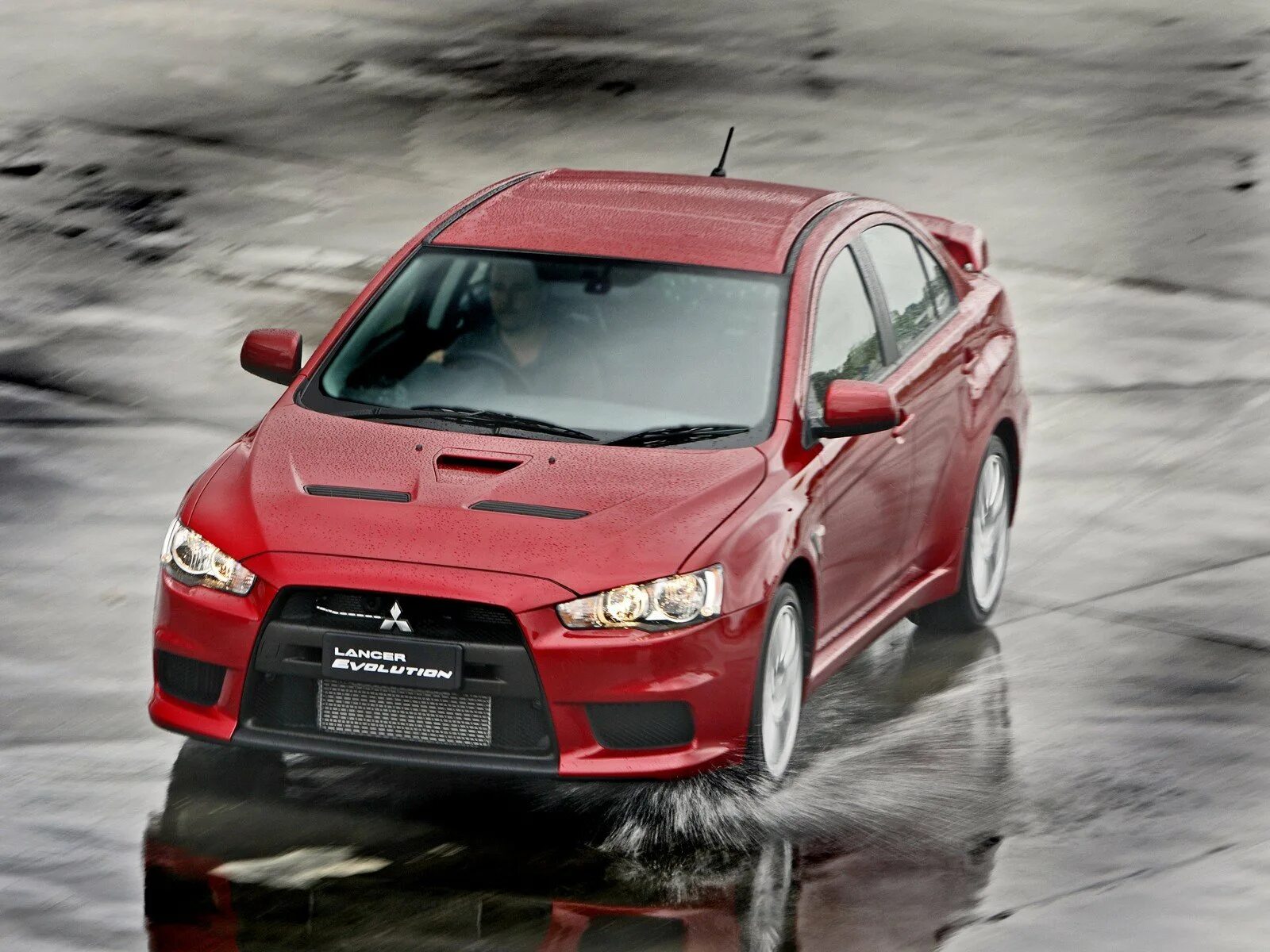 Мицубиси самая самая. Митсубиси Лансер 10. Mitsubishi Lancer Evolution x 2008. Mitsubishi Lancer EVO 10. Ланцер Эво 11.