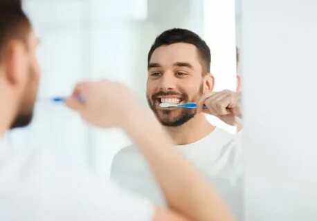 Cleans his teeth