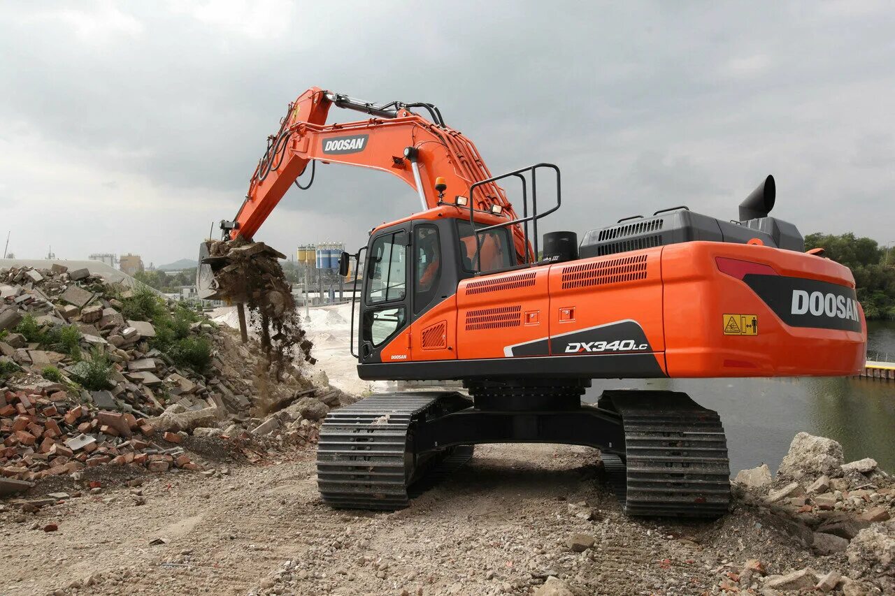 Экскаватор Doosan dx340lca-k. Doosan dx340. Экскаватор Дусан 340. Гусеничный экскаватор Doosan dx340lca. Досан экскаватор