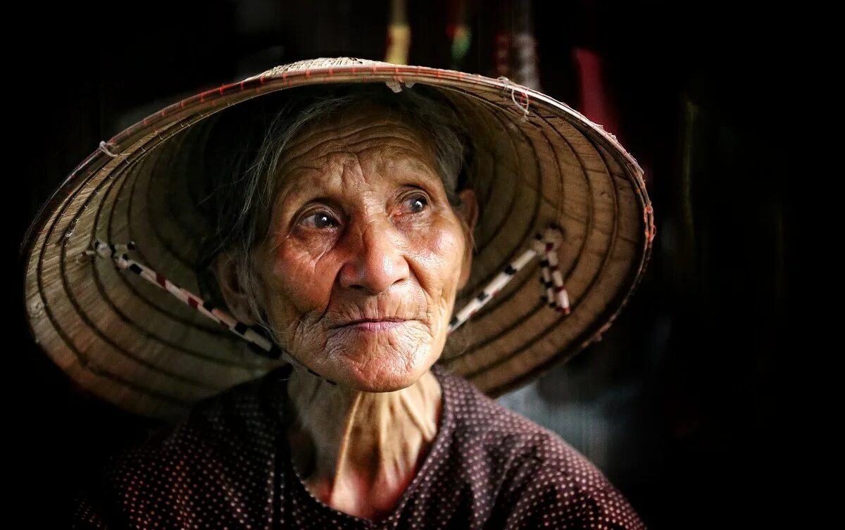 Old life. Old thoughts. Grandma smiles portrait. Misrepresentation. Лупа и текст.